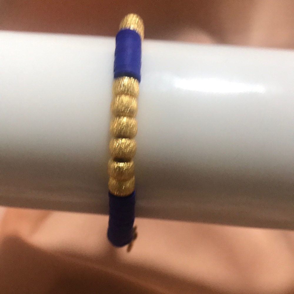 Mayamar my favorite blue gold bracelet stretches from 5-7 1/2 inches very classy